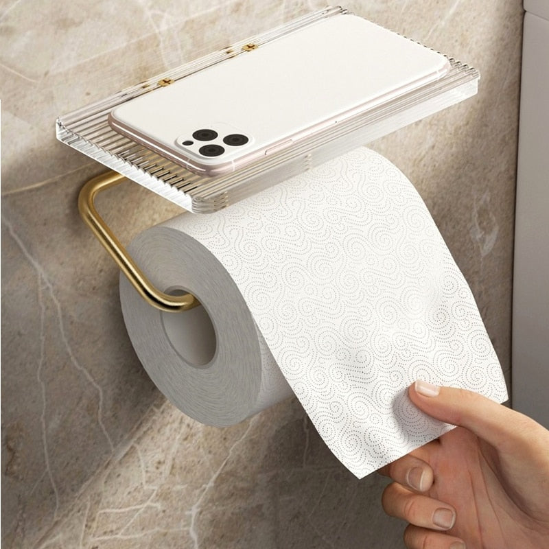 Suporte para Papel Higiênico com Prateleira em Dourado Castiliani, ideal para organizar o banheiro com elegância e funcionalidade