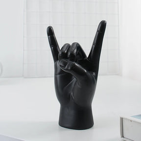Escultura de Mãos Rock Decoração Moderna Castiliani, arte em resina dourada para amantes do rock e decoração estilosa.

